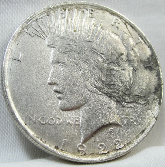Very-Odd-Peace-Dollar.-Any-Help-Appreciated